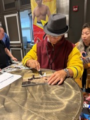 signing photo