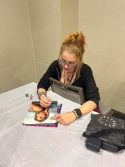 signing photo