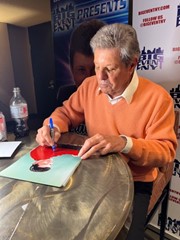 signing photo