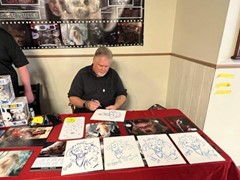 signing photo