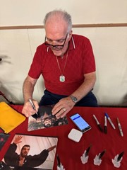 signing photo