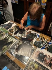 signing photo