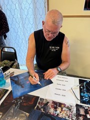 signing photo